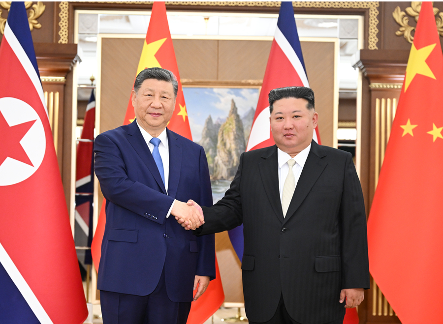 习近平同金正恩举行会谈